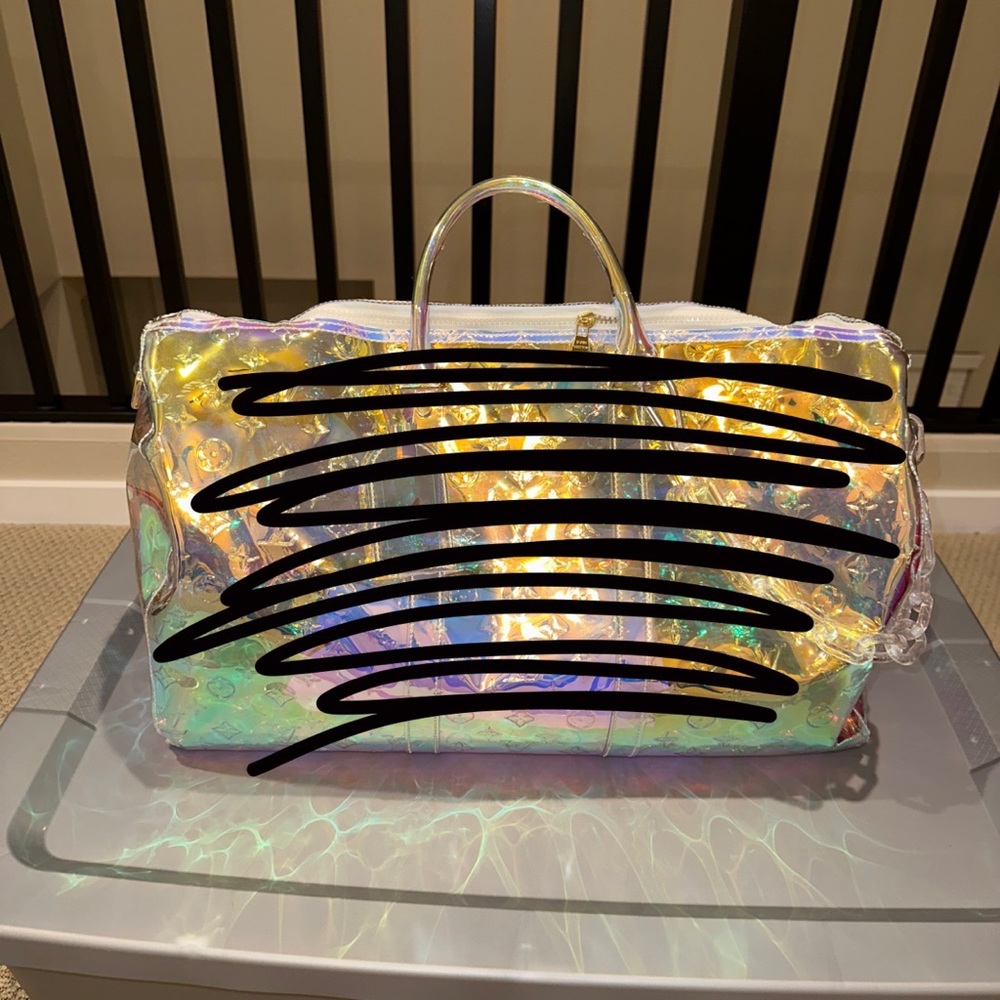 Holographic dupe duffle bag